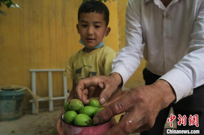 圖為進藏先遣英雄連誓師地原址所在的新疆維吾爾自治區(qū)和田地區(qū)于田縣普魯村現(xiàn)貌?！畛坛?攝