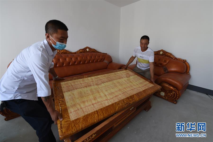 （新華全媒+）（27）千里“挪窩”，踏實開啟新生活