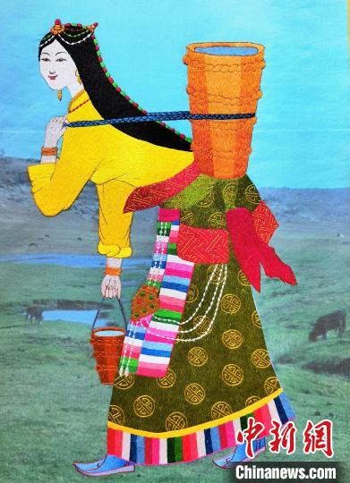 圖為藏繡作品《背水姑娘》?！∑钤鲚?攝