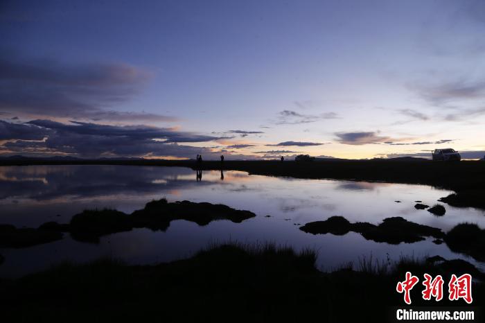 圖為夕陽下的查旦濕地?！●R銘言 攝